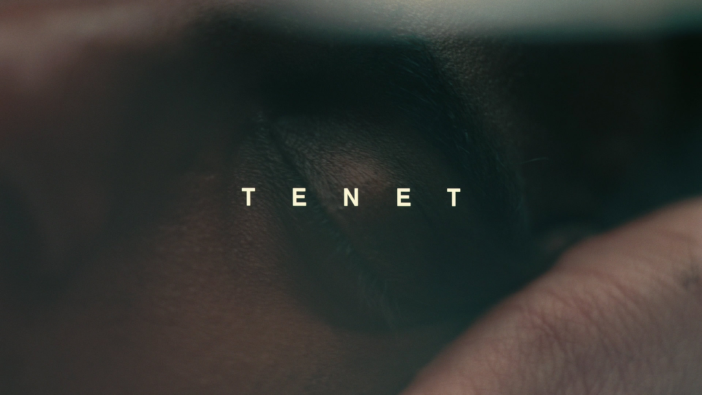 Tenet ending explained – movie poster-style image featuring the Tenet title over a close-up of the Protagonist
